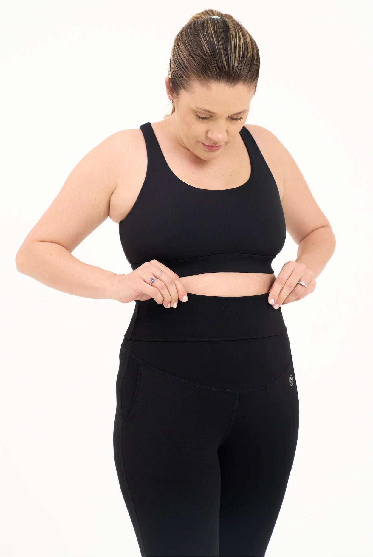 Mum wearing flared maternity leggings in black