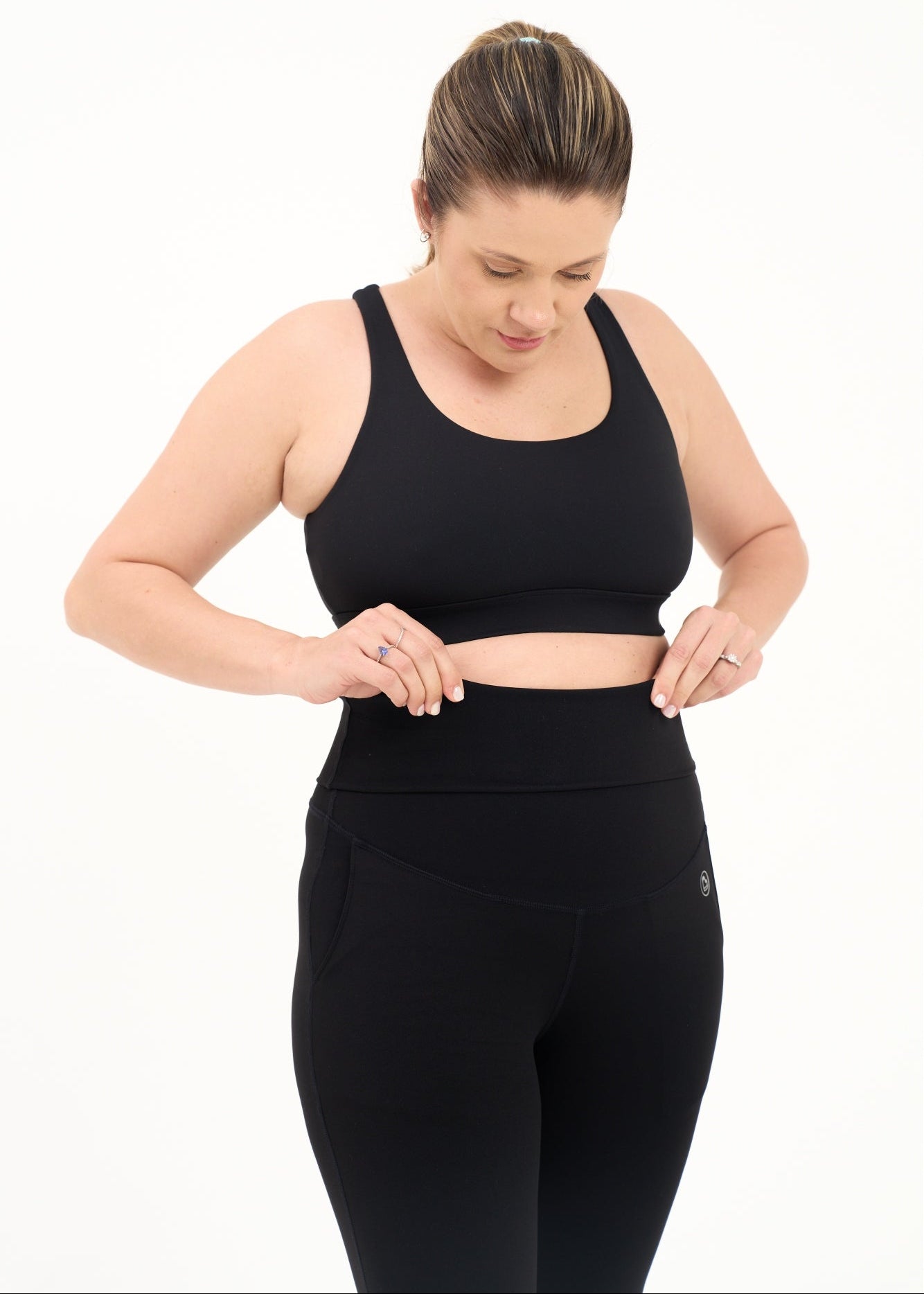 Mum wearing flared maternity leggings in black