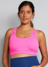 Nursing sports bra, hot pink, front view on model