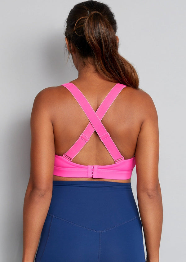 Nursing sports bra, hot pink, back view on model